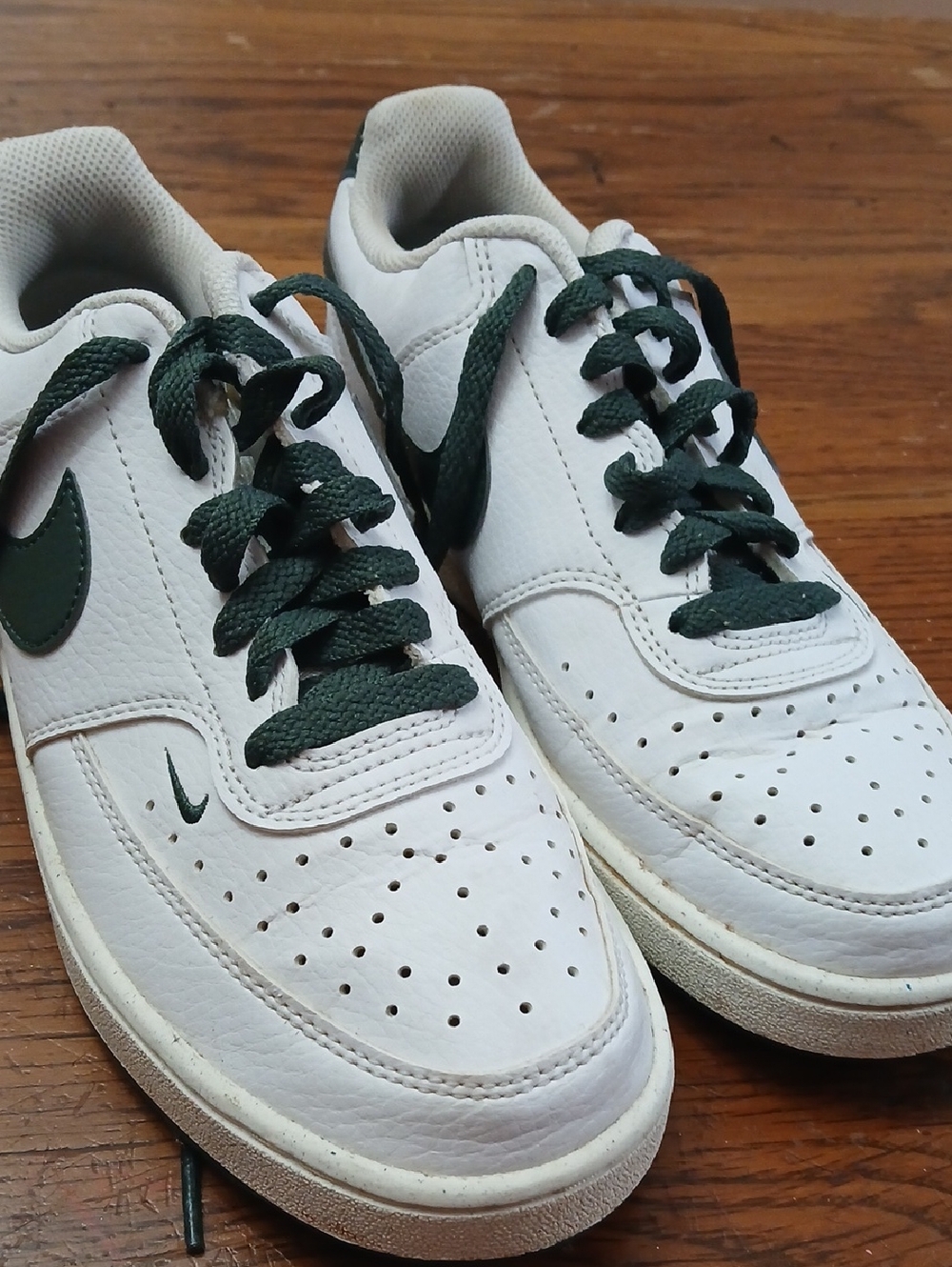 Nike White Leather Sneakers with Dark Green Swoosh and Laces